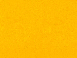 The yellow concrete wall texture with vintage style, Blank of shiny yellow paint cement background with copy space concept