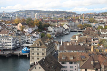 Fototapeta na wymiar A view from Grossmünster (Romanesque-style Protestant church) of Zurich Switzerland and Limmat river.