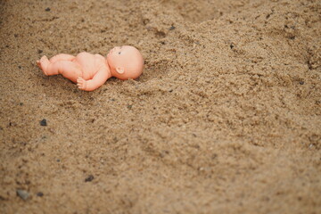 Children's toys in the sandbox in the summer outdoors