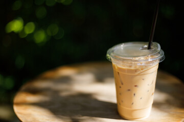 Iced latte coffee on the wood table