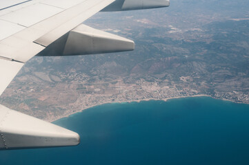 Aerial view from plane to the sea bay