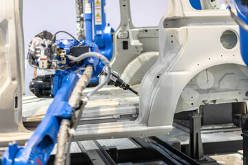 robot arm working in factory