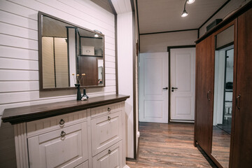 Modern interior of a small wooden house in the Scandinavian style.