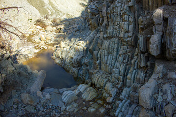 A dry river in a canyon in the mountains.