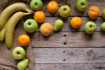 Assorted fruits on rustic table