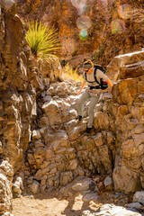 Woman Climbs Down Dry Fall in Upper Burro Mesa Pouroff
