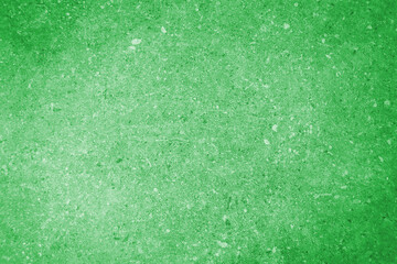 Shiny green glitter background. Green texture for superior elegant design view. 