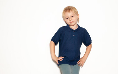 Cheerful little boy on a white background