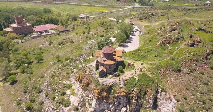 famous ancient monastery of Hayravank in Armenia with the legendary Lake Sevan. Strong contrast and film grain filter added.