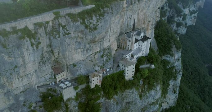 Aerial Panning Beautiful Shot Of Madonna Della Corona Chapel On Rock Formation - Santuario de la Madonna della Corona, Italy