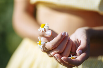 girl holding a lollipop