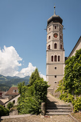 Fototapeta na wymiar Church of St. Laurentius ( Laurentiuskirche) on a summer day with blue sky, Bludenz (Austria)