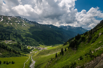 Fototapeta na wymiar Alpine green landscape in Stuben am Arlberg, ski resort, Vorarlberg, Austria