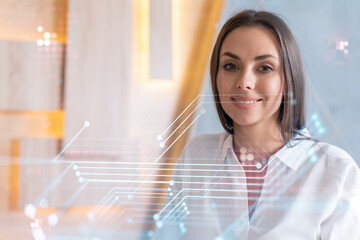 Portrait of attractive smiling businesswoman in formal wear thinking how to optimize business process by applying new technologies. Hi tech holograms over modern office background