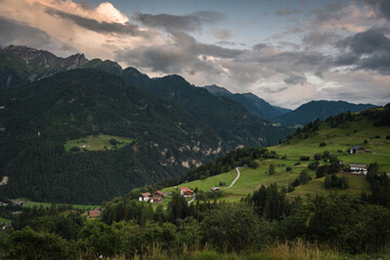 Fototapeta na wymiar Alpine green landscape in summer on a cloudy day, ski resort, Vorarlberg, Austria