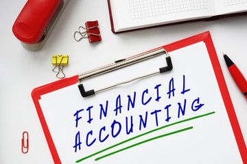 Business concept about FINANCIAL ACCOUNTING with inscription on the piece of paper.