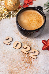 new year background christmas coffee and decorations on the table holiday decor gifts food background rustic top view copy space