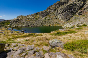A lake in the Peñalara mountains in the Northern Mountain range of Madrid. This part has wonderful hikes starting and panoramic views over the hills and valleys. 