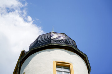 Onion dome with onion helmet or onion dome photographed on a church tower as an architectural roof construction in Bavaria
