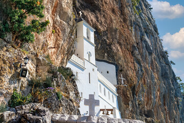 Ostrog orthodox monastery in Montenegro, Upper church on Holy Cross in the rocks. Founded in 17th century. - obrazy, fototapety, plakaty