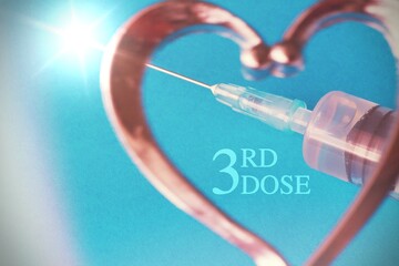 Close up of a syringe with a heartshape .