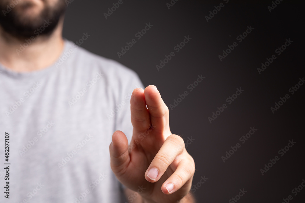 Poster Businessman pointing or touching finger in screen..