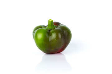 Raw bell pepper on the white glossy background