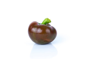 Raw bell pepper on the white glossy background