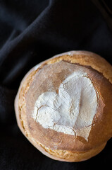 Artisan bread on black background