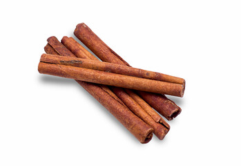 Four cinnamon trees isolated on a white background.