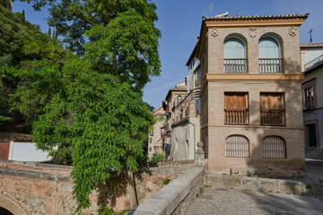 Fototapeta na wymiar Casa de las Chirimias on the Paseo de los Triestes in Granda, Spain. 