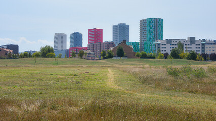 Vitoria-Gestaiz, Spain - 21 August, 2021: Urban tower blocks from Salburua wetlands nature reserve...