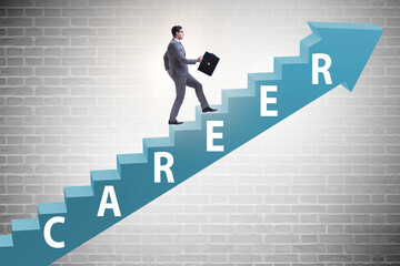 Fototapeta premium Businessman climbing career ladder in business concept