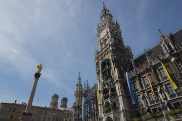 Munich, Bavaria, Germany - August 13, 2021: cityscape at the "Marienplatz" while Covid19 pandemic, view to the city hall with the "Glockenspiel", in the background the Church of our Lady