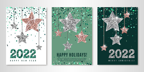 Happy Holidays banners set of three sheets with shimmer hanging stars, emerald confetti and 2022 numbers. Vector flyer design templates for greeting cards