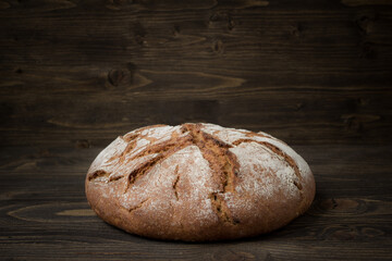 Rye bread on wooden background