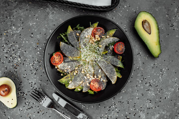 salad with avocado poppy seeds and pear. Fresh dietary salad. Healthy breakfast