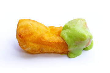 Deep-fried dough stick or chinese bread stick with steamed custard on white background.