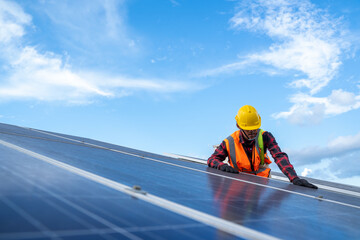 Engineer or electrician checking and maintenance on replacement solar panel at solar power plant,Green energy and sustainable development for solar energy power generator.