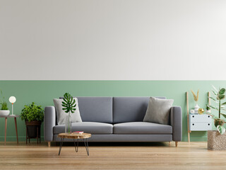 Grey sofa in simple living room interior.
