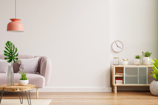 Interior wall mockup with sofa and cabinet in living room with empty white wall background.