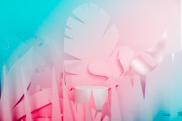 White Cylinder podiums among paper tropical leaves. Showcase podiums for cosmetic products.Mock up for the exhibitions,presentation of products,