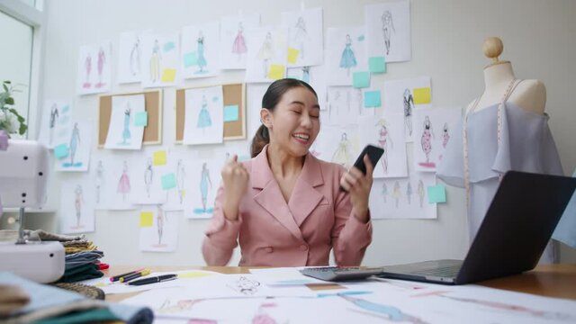 Asia happy people or lady shock scream excited sell enjoy good news work at home office store shop read text of bank fund money approve with crazy joy, sale job win. P2P microfinance app for SME sale.