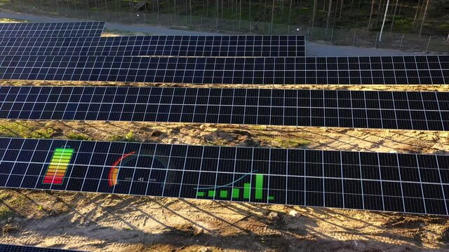 Aerial view over a photovoltaic panels with battery icons and HUD - 3d animation