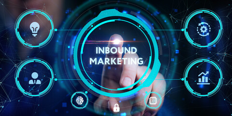 The concept of business, technology, the Internet and the network. A young entrepreneur working on a virtual screen of the future and sees the inscription: Inbound marketing
