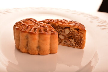 traditional Chinese baked mooncake lotus, egg yolk, red bean, mixed nuts pastry for mid autumn festival