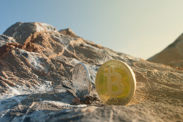 bitcoin coins,with NFT coins on natural stone background ,for investment ideas and designs,space for text