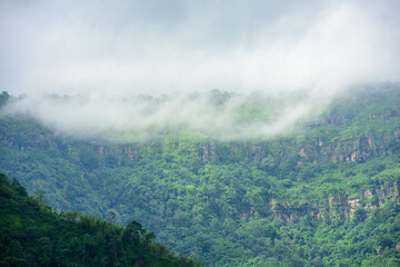 mountains with clouds in a tropical forest