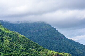 mountains with clouds in a tropical forest