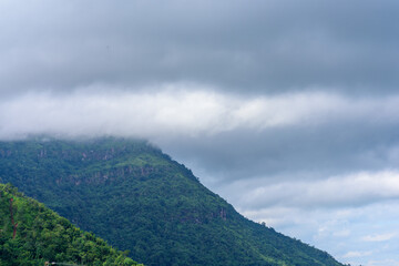 mountains with clouds in a tropical forest